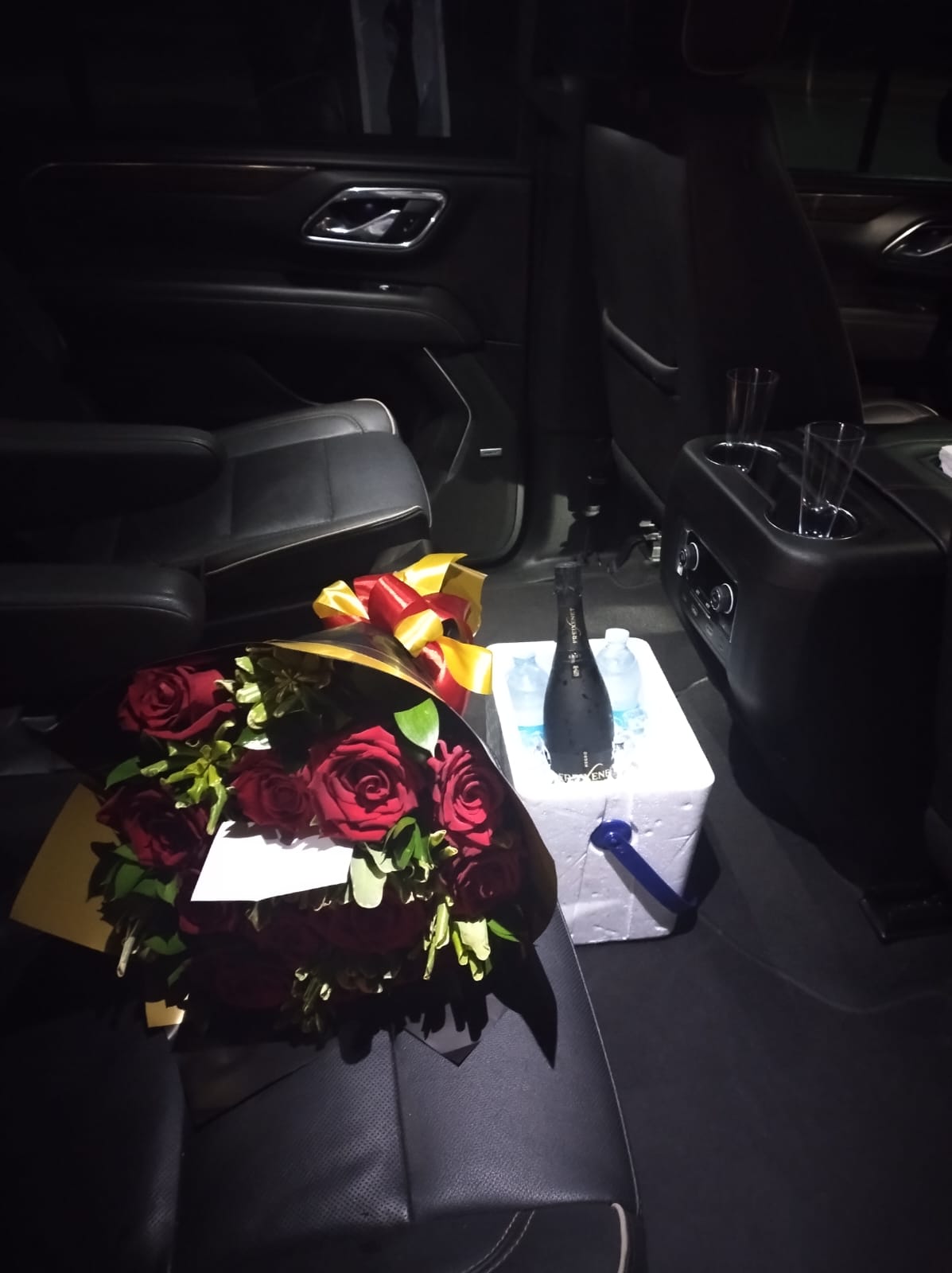 Champagne and arrival styling inside a premium vehicle